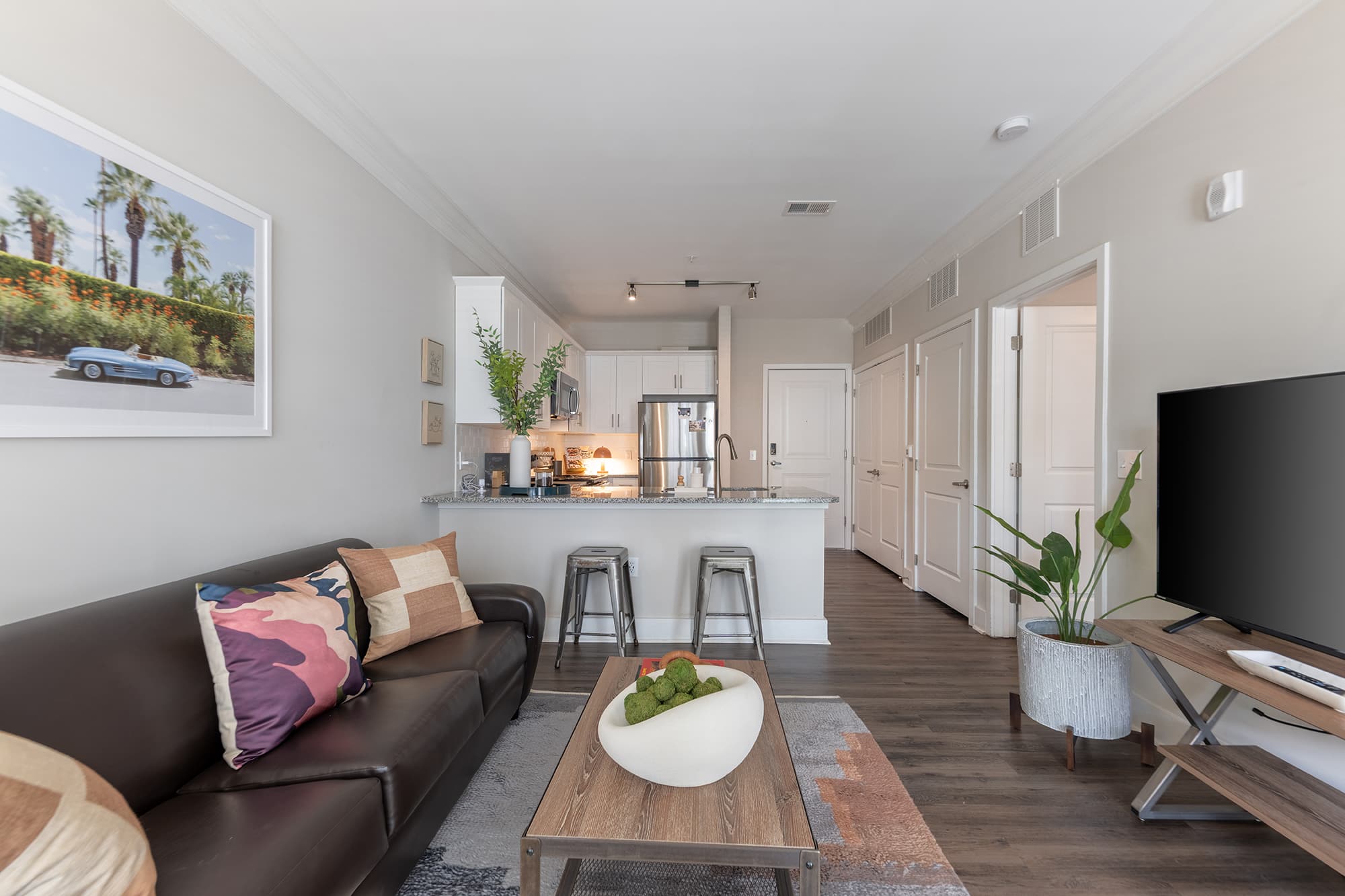 quantum on west call off campus apartments near florida state university fully furnished living room to kitchen